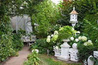 Seating area with vintage garden decoration 