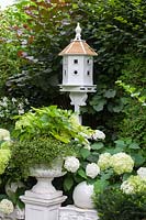 Vintage garden decoration with dovecote 