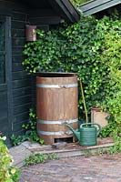 Water barrel in the rural garden 