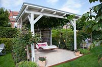 Arbor with swing lounger 