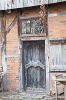 Door made of old building materials 