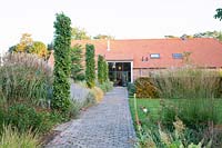 Garden with beech columns at the entrance, Carpinus betulus 