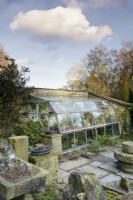 Sunken glasshouse on one side of the Paved Garden at York Gate in February