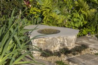 Stone water feature - 'It Doesn't Have to Cost the Earth' - designer Michael Lote - RHS Malvern Spring Festival 2024